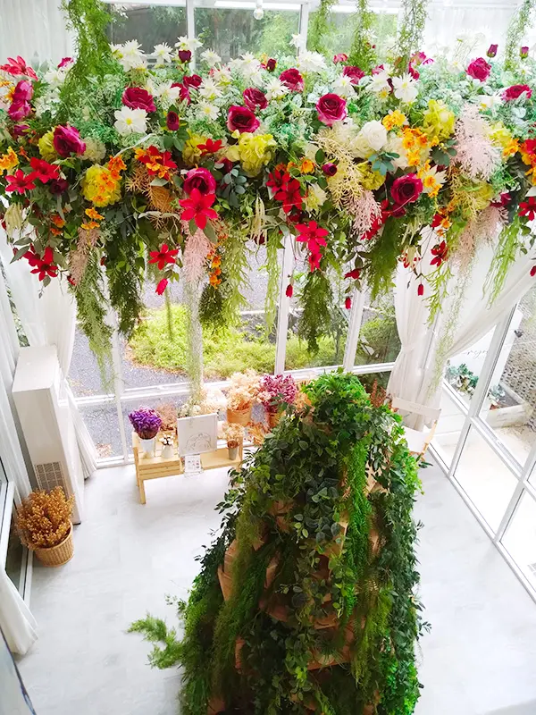 A large tree in the cafe seen from the 2nd floor