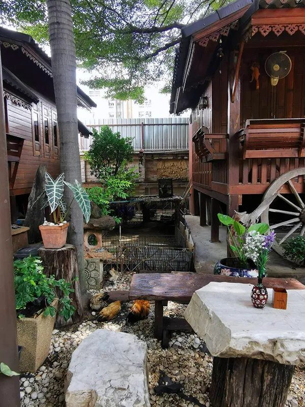 Wooden restaurant and chicken coop